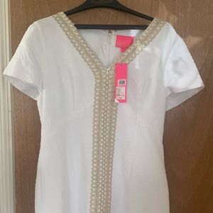 Beautiful white textured Lilly Pulitzer dress with gold braided trim.
